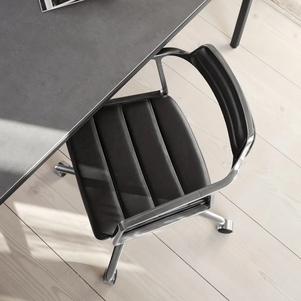 VIPP 452 // SWIVEL CHAIR - BLACK LEATHER, POLISHED FRAME, CASTERS